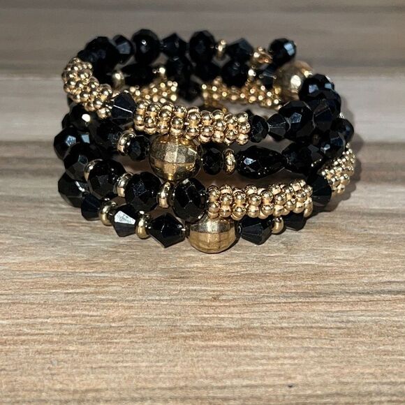Jewelry - Black Faceted Wrap Bracelet With Gold Tone Accents